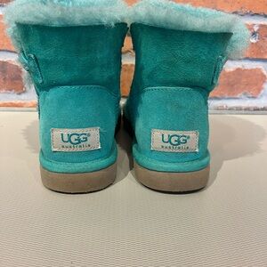 UGG Kids' Teal Boots with Tan Soles.  Pre-owned with slight wear marks.